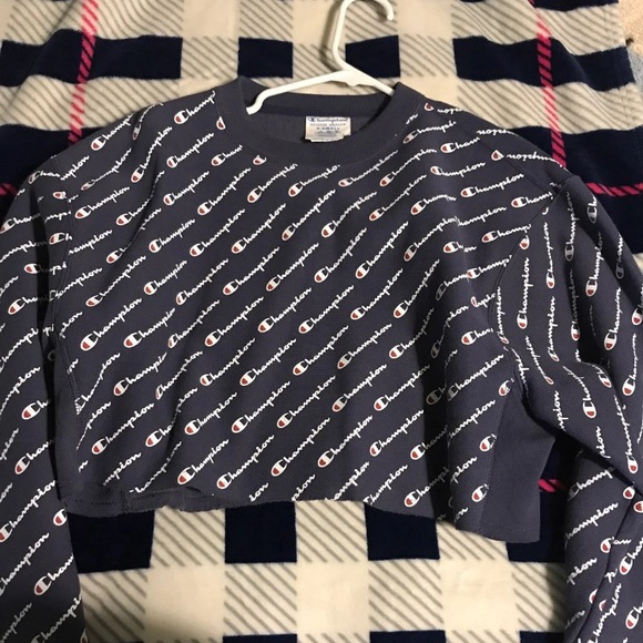 white champion hoodie with champion written all over it